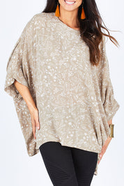 Model Gemma wearing size 10 of the On The Horizon Swing Top in colour Khaki (Green), from the front, cropped image