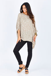 Model Gemma wearing size 10 of the On The Horizon Swing Top in colour Khaki (Green), from the front, showing the whole outfit