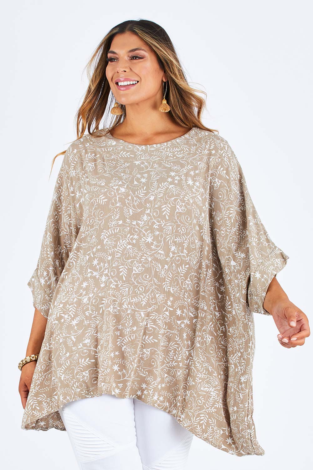 Model Palatina wearing size 14 of the On The Horizon Swing Top in colour Khaki (Green), from the front, cropped image