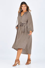 Model Palatina wearing size 14 of the Going With The Flow Dress in colour Taupe, from the front, showing the whole outfit