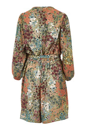 Product shot of the Flower Safari Jumpsuit in colour Khaki (Green), from the back