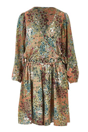 Product shot of the Flower Safari Jumpsuit in colour Khaki (Green), from the front
