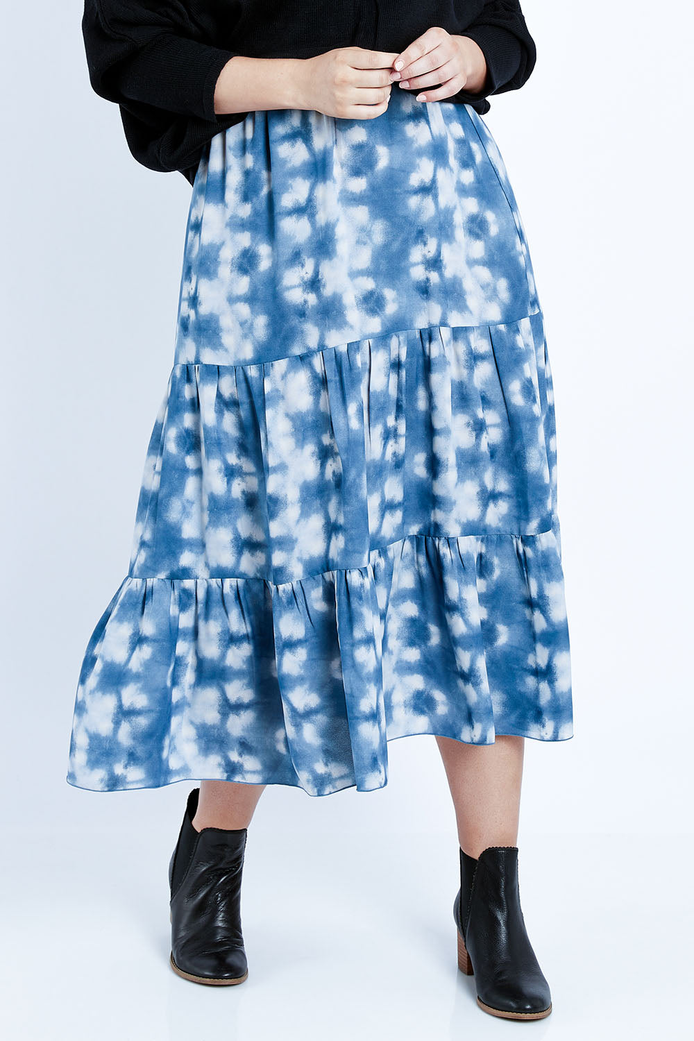 Model Jess wearing size 14 of the My Wild Side Skirt in colour Blue (Blue), from the front, cropped image