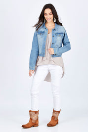 Model Georgia wearing size 10 of the Heartbeat Denim Jacket in colour Denim (Blue), from the front, showing the whole outfit