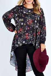 Model Jess wearing size 14 of the Floating By You Blouse in colour Black (Black), from the front, cropped image