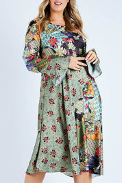 Model Jess wearing size 14 of the Mixing It Up Dress in colour Khaki (Green), from the front, cropped image