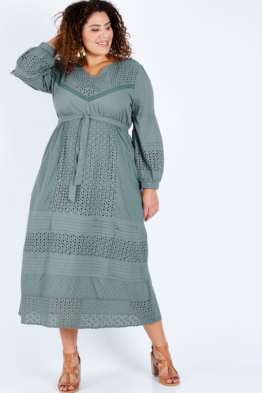 Model Jess wearing size 16 of the Picnic In the Fields Dress in colour Stormy (Green), from the front, showing the whole outfit