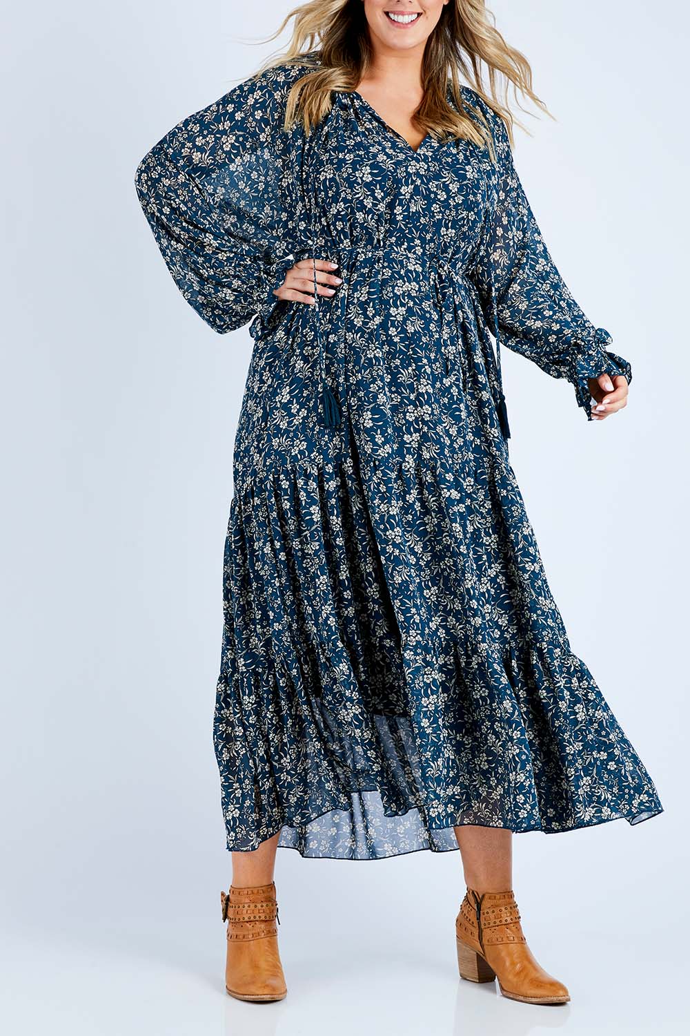 Model Jess wearing size 14 of the Floating By You Maxi in colour Ocean (Blue), from the front, cropped image