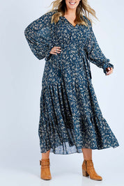 Model Jess wearing size 14 of the Floating By You Maxi in colour Ocean (Blue), from the front, cropped image