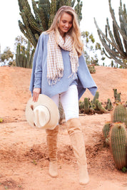 Model Marnee wearing size 10 of the Feels Like A Cloud Slouch Top in colour Denim (Blue), from the front, showing the whole outfit