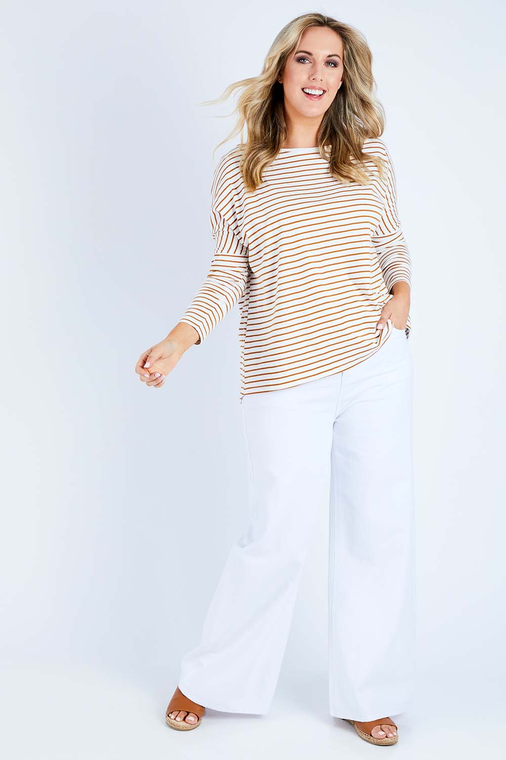 Model Jess wearing size 14 of the Lazy Day Cotton Tee in colour Ruststripe, from the front, showing the whole outfit