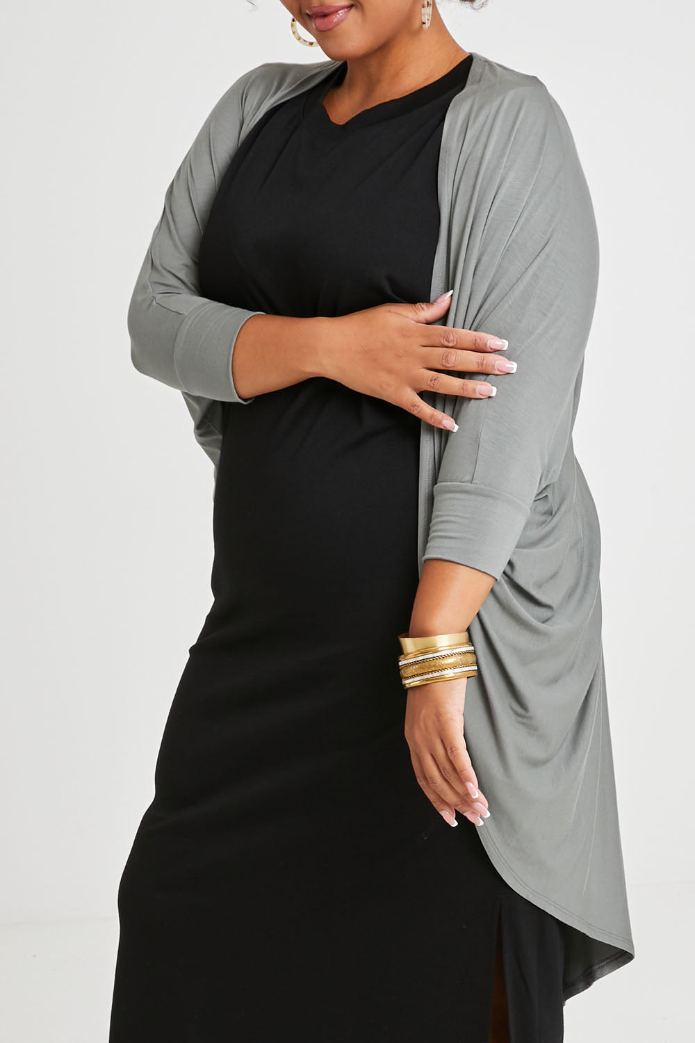 Model Alexis wearing size 16 of the Falling For You Bamboo Cardi in colour Fern (Green), from the front, cropped image