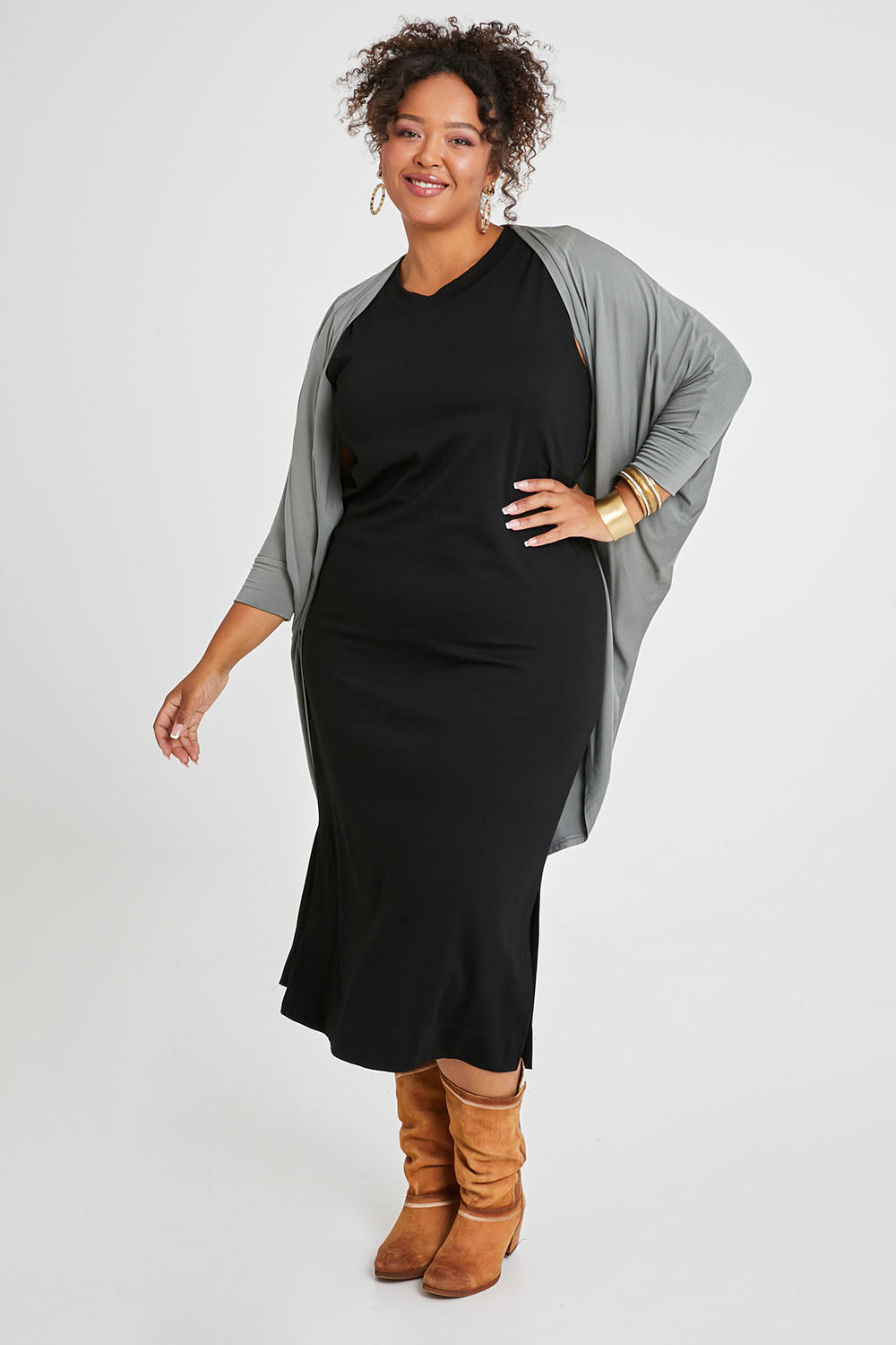 Model Alexis wearing size 16 of the Falling For You Bamboo Cardi in colour Fern (Green), from the front, showing the whole outfit