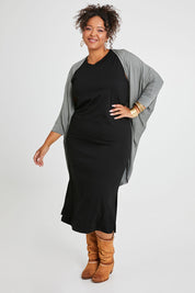 Model Alexis wearing size 16 of the Falling For You Bamboo Cardi in colour Fern (Green), from the front, showing the whole outfit