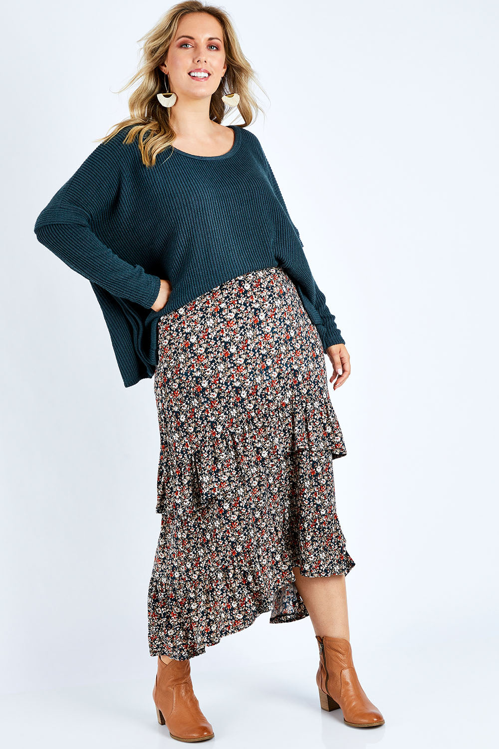 Model Jess wearing size 14 of the Tiers Of Delight Skirt in colour Ditsy (Green), from the front, showing the whole outfit