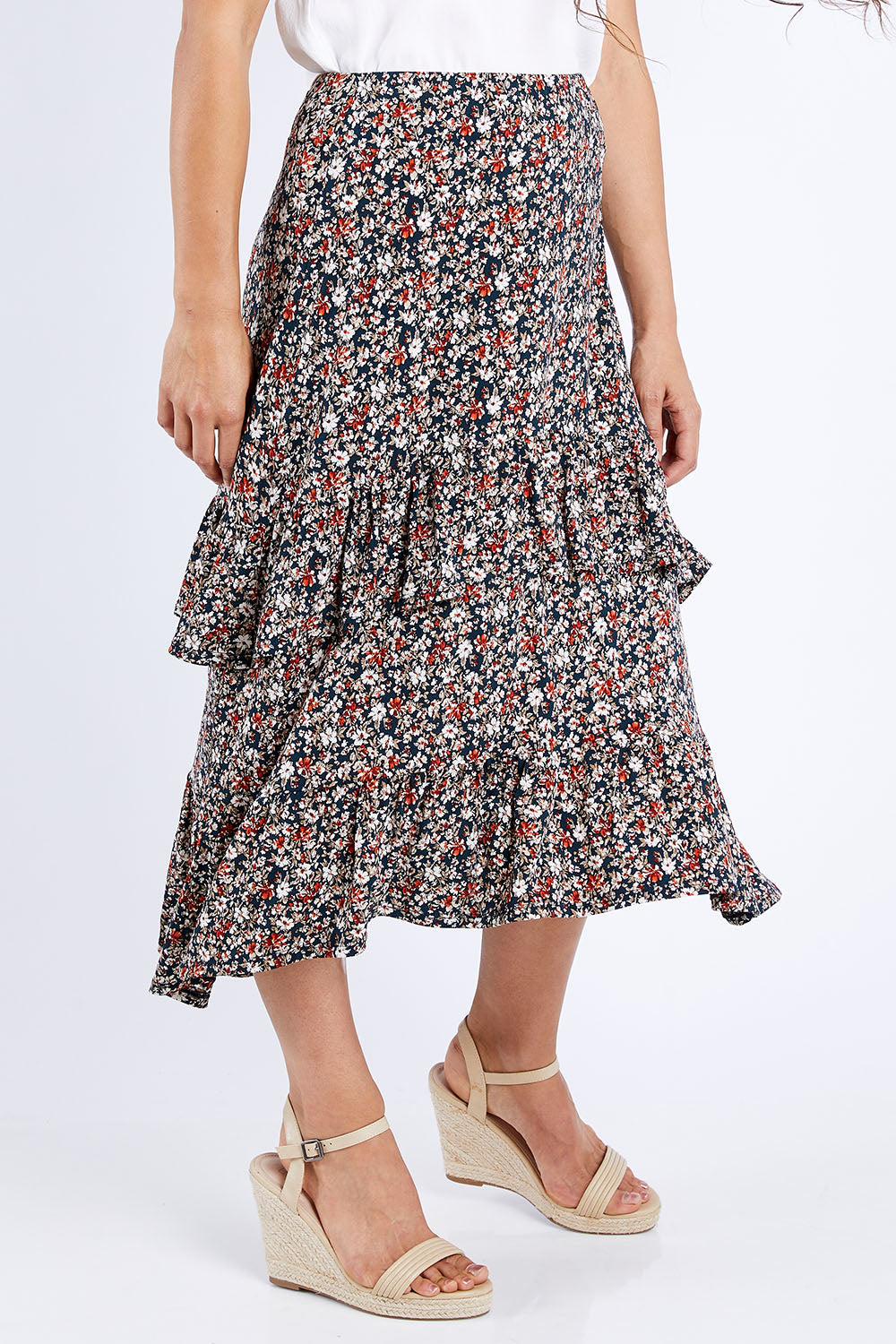 Model Larissa wearing size 10 of the Tiers Of Delight Skirt in colour Ditsy (Green), from the front, cropped image