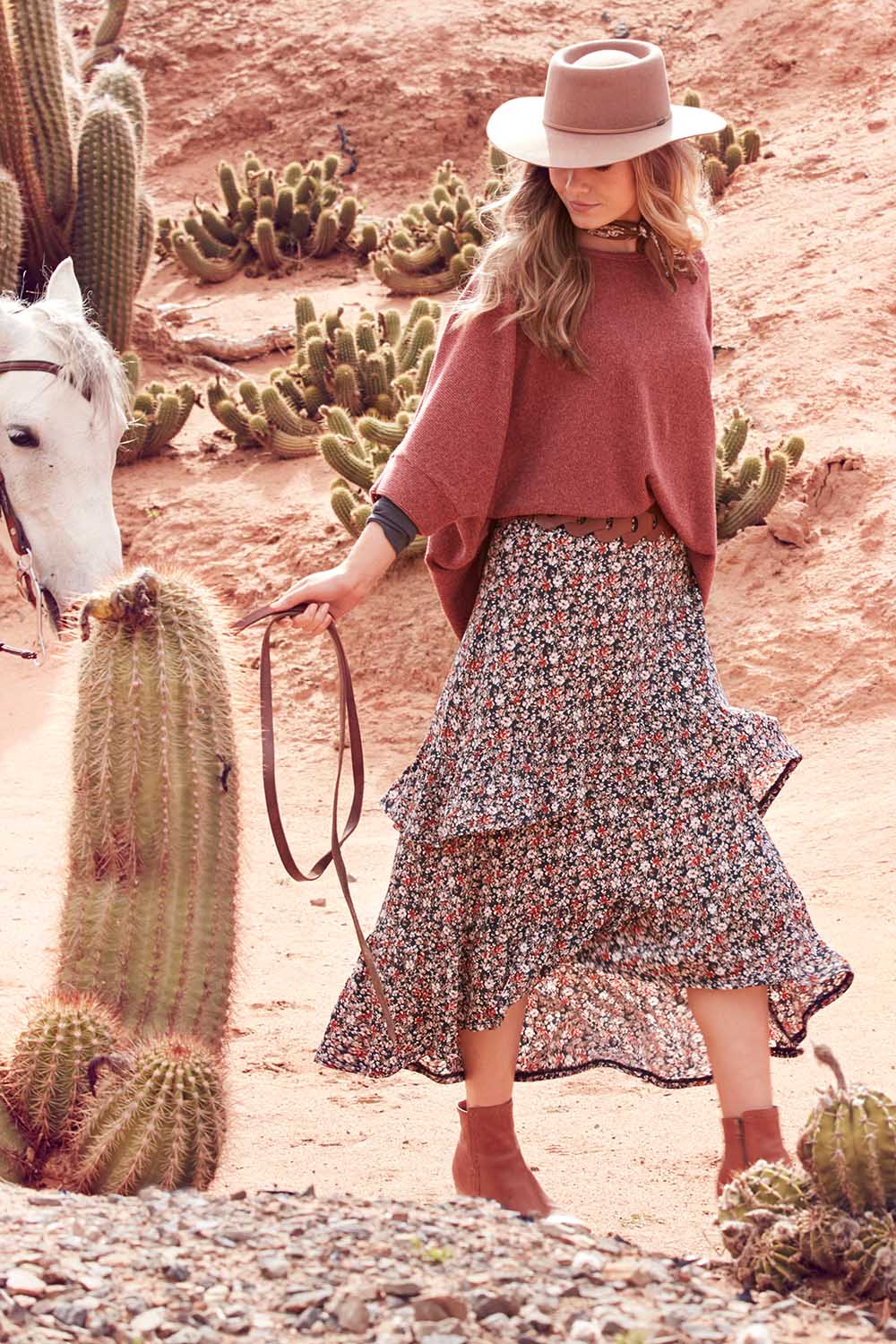 Model Marnee wearing size 10 of the Tiers Of Delight Skirt in colour Ditsy (Green), from the front, showing the whole outfit