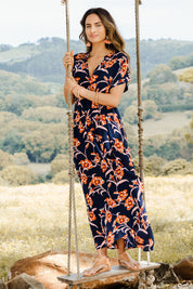 Model Ilona wearing size 10 of the Wild Garden Maxi Dress in colour Bluefleur (Blue), from the front, showing the whole outfit