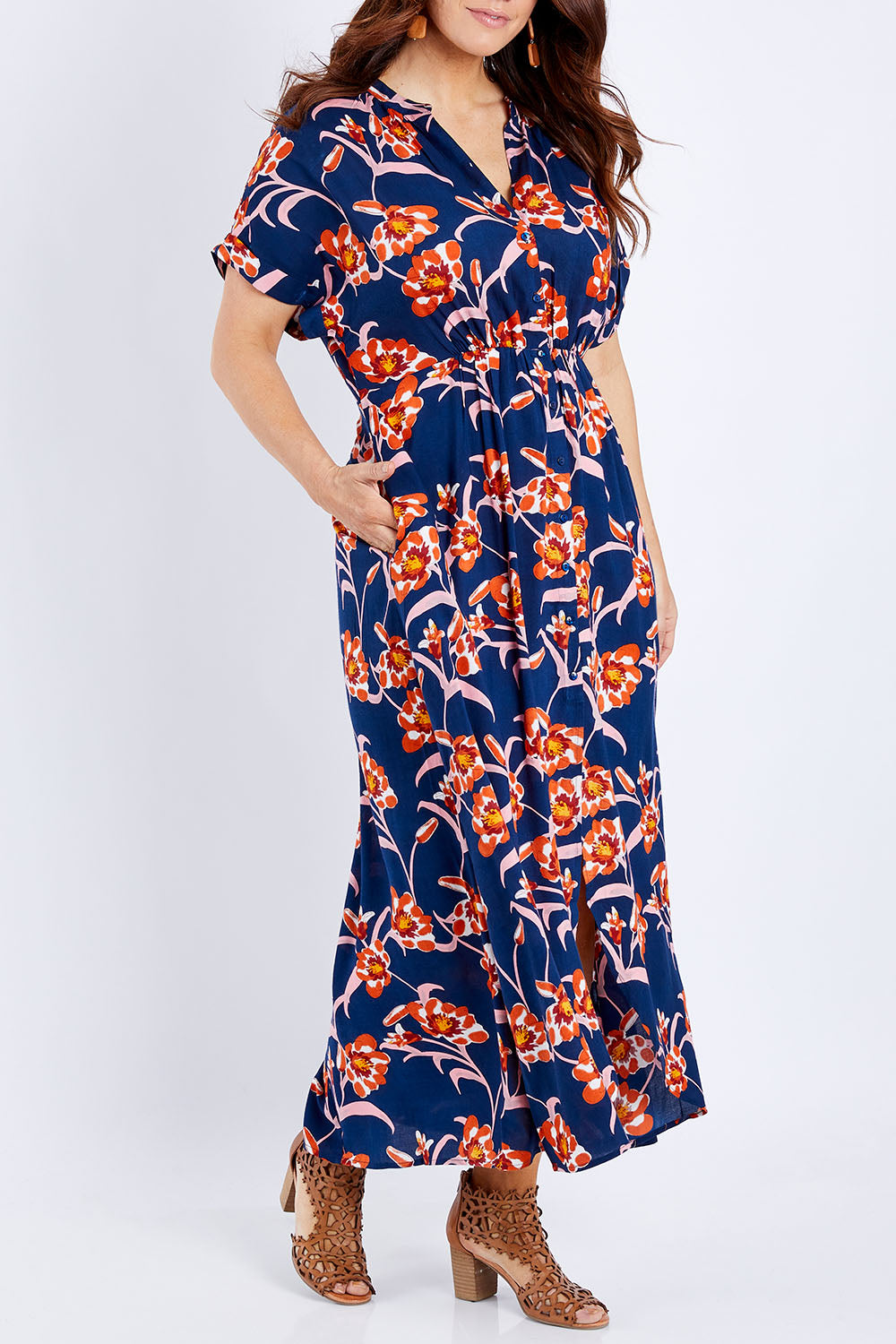 Model Laura wearing size 14 of the Wild Garden Maxi Dress in colour Bluefleur (Blue), from the front, cropped image