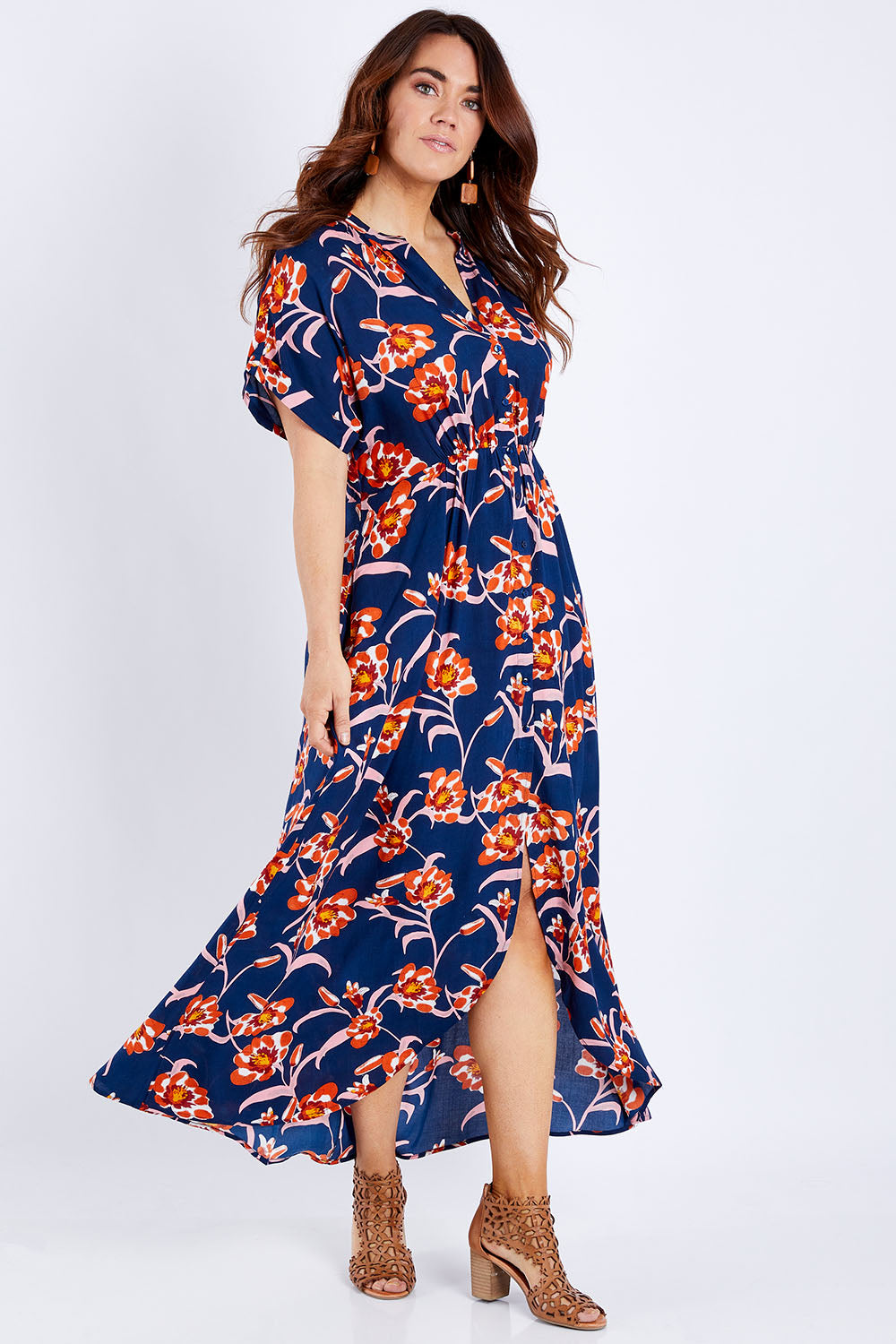 Model Laura wearing size 14 of the Wild Garden Maxi Dress in colour Bluefleur (Blue), from the front, showing the whole outfit