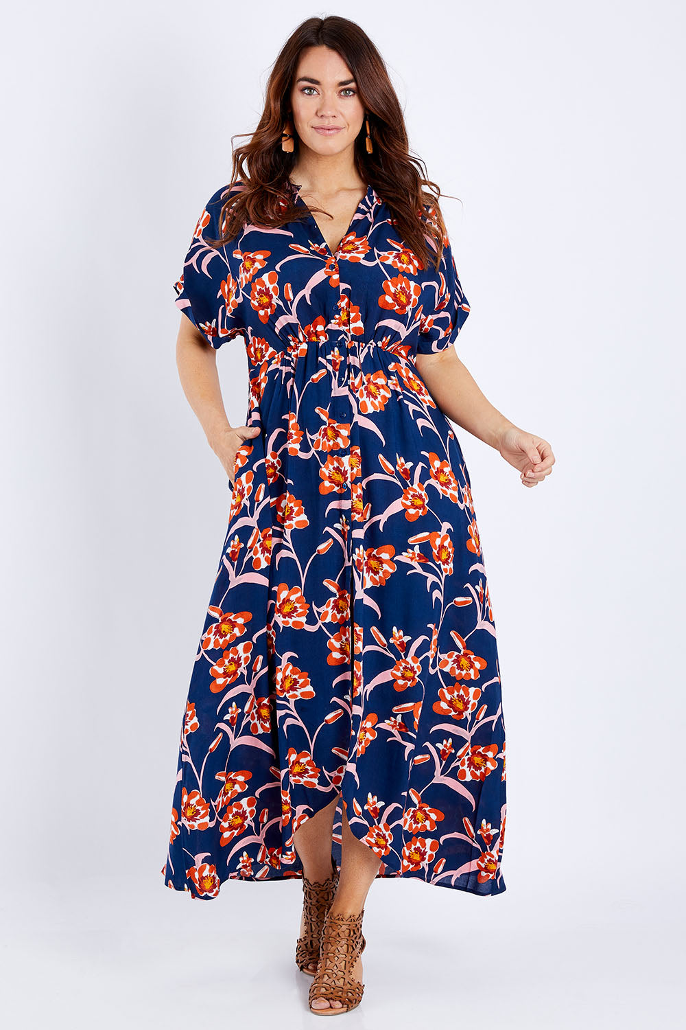 Model Laura wearing size 14 of the Wild Garden Maxi Dress in colour Bluefleur (Blue), from the front, showing the whole outfit