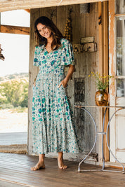 Model Ilona wearing size 10 of the Tiers Of Joy Maxi Dress in colour Bluefleur (Blue), from the front, showing the whole outfit