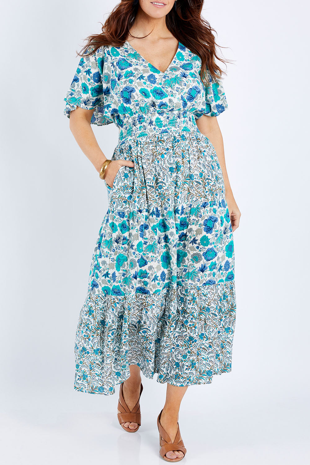 Model Laura wearing size 14 of the Tiers Of Joy Maxi Dress in colour Bluefleur (Blue), from the front, cropped image
