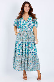 Model Laura wearing size 14 of the Tiers Of Joy Maxi Dress in colour Bluefleur (Blue), from the front, showing the whole outfit