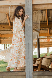 Model Ilona wearing size 10 of The Frills You Give Me Blouse in colour Rustfleur (White), from the front, showing the whole outfit