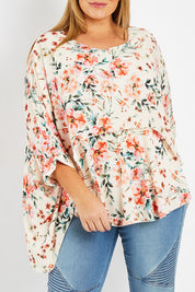 Model Fiona wearing size 16 of the Garden Party Blouse in colour Floral (Pink), from the front, cropped image