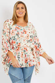 Model Fiona wearing size 16 of the Garden Party Blouse in colour Floral (Pink), from the front, cropped image