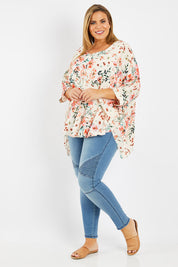 Model Fiona wearing size 16 of the Garden Party Blouse in colour Floral (Pink), from the front, showing the whole outfit