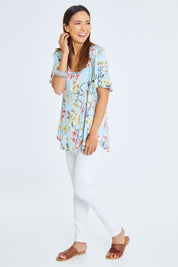 Model Cara wearing size 10 of the Free Falling Top in colour Blossom (Blue), from the front, showing the whole outfit