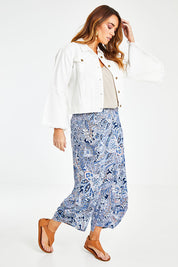 Model Laura wearing size 14 of the Good Vibes Balloon Hem Pants in colour Blues (Blue), from the front, showing the whole outfit