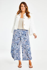 Model Laura wearing size 14 of the Good Vibes Balloon Hem Pants in colour Blues (Blue), from the front, showing the whole outfit