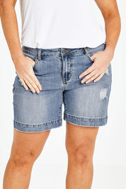 Model Laura wearing size 14 of the Youre Always There For Me Boyfriend Shorts in colour Denim (Blue), from the front, cropped image