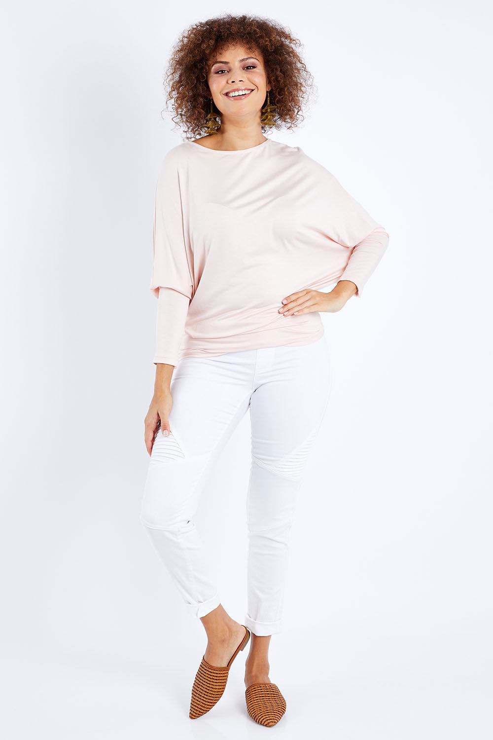 Model Lala wearing size 10 of the Softly Swinging Bamboo Batwing Top in colour Ballet (Pink), from the front, showing the whole outfit