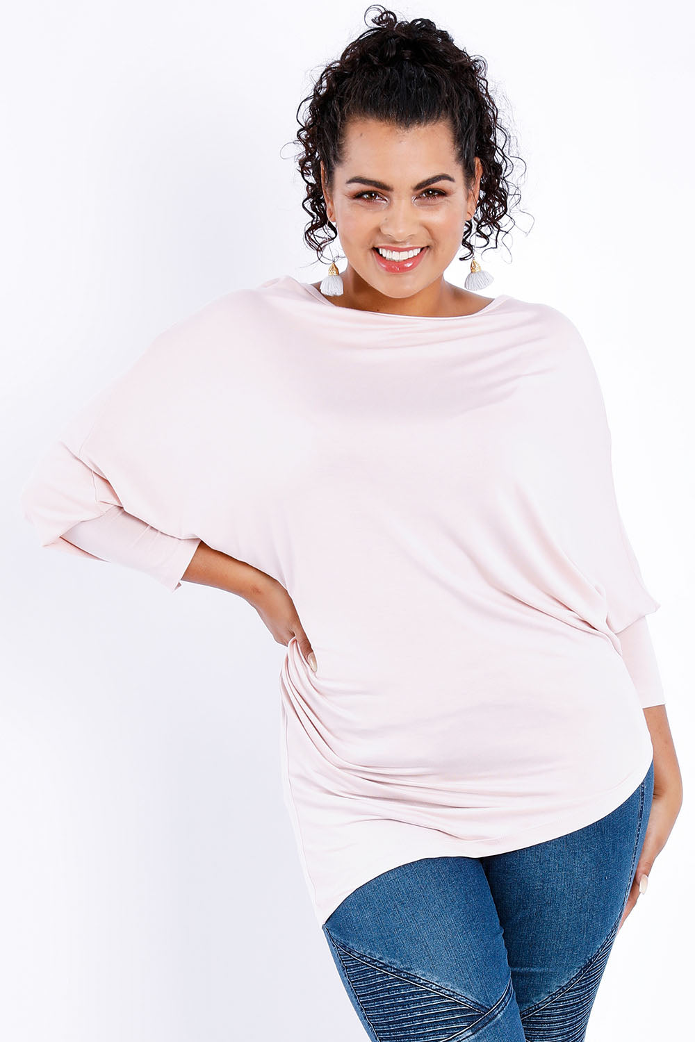 Model Sasha-Lee wearing size 16 of the Softly Swinging Bamboo Batwing Top in colour Ballet (Pink), from the front, cropped image