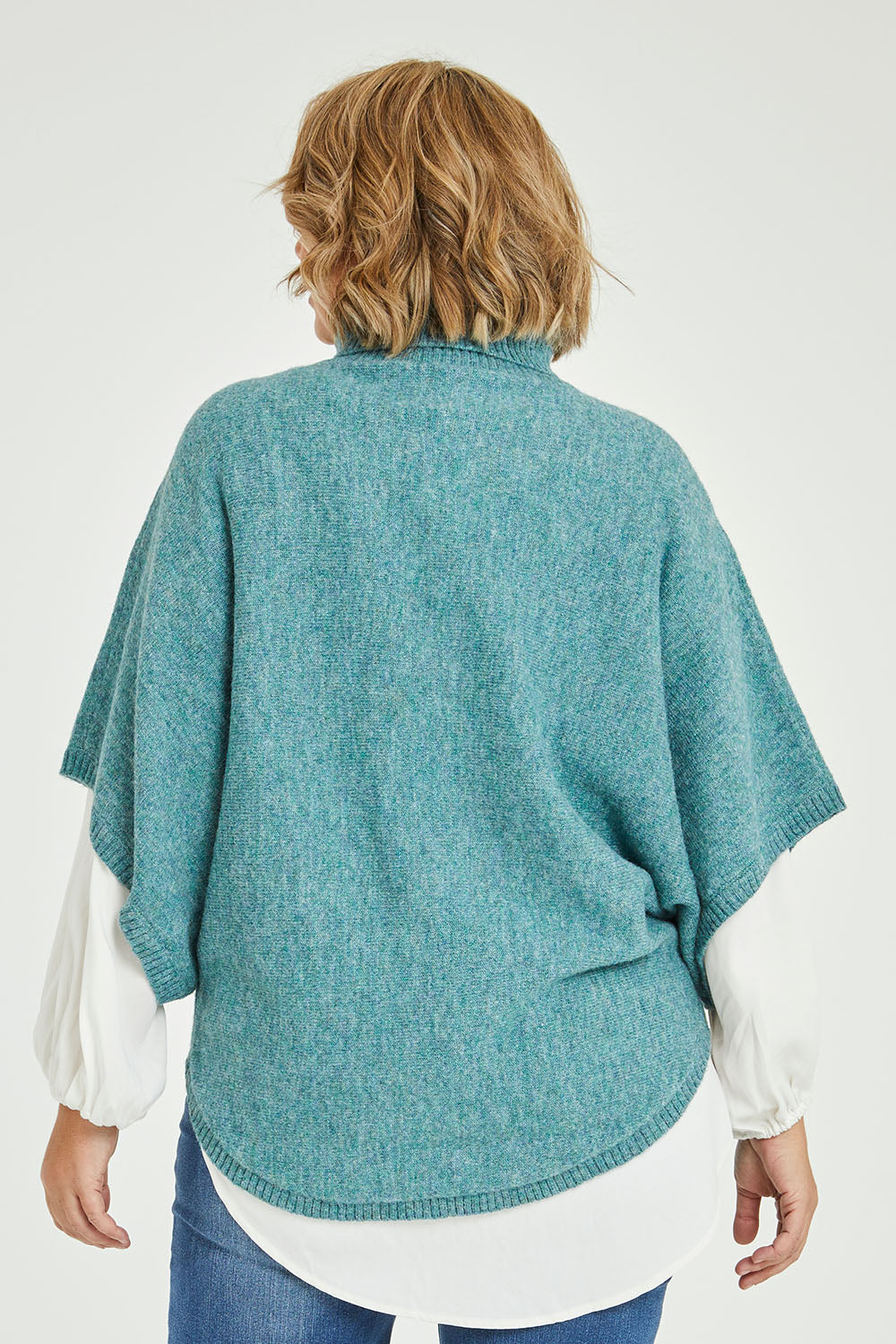 Model Fiona wearing size XL of the Addicted To You Sweater in colour Sea (Blue), from the back
