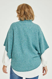 Model Fiona wearing size XL of the Addicted To You Sweater in colour Sea (Blue), from the back
