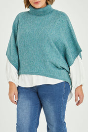 Model Fiona wearing size XL of the Addicted To You Sweater in colour Sea (Blue), from the front, cropped image
