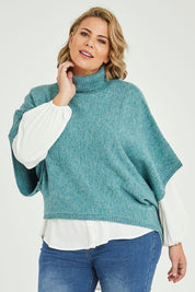 Model Fiona wearing size XL of the Addicted To You Sweater in colour Sea (Blue), from the front, cropped image