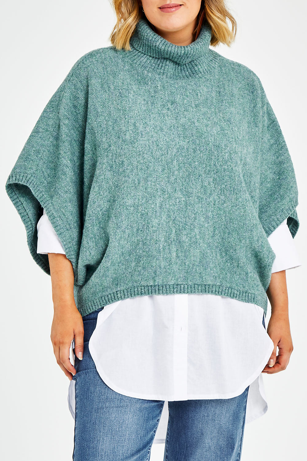 Model Jess wearing size L of the Addicted To You Sweater in colour Sea (Blue), from the front, cropped image