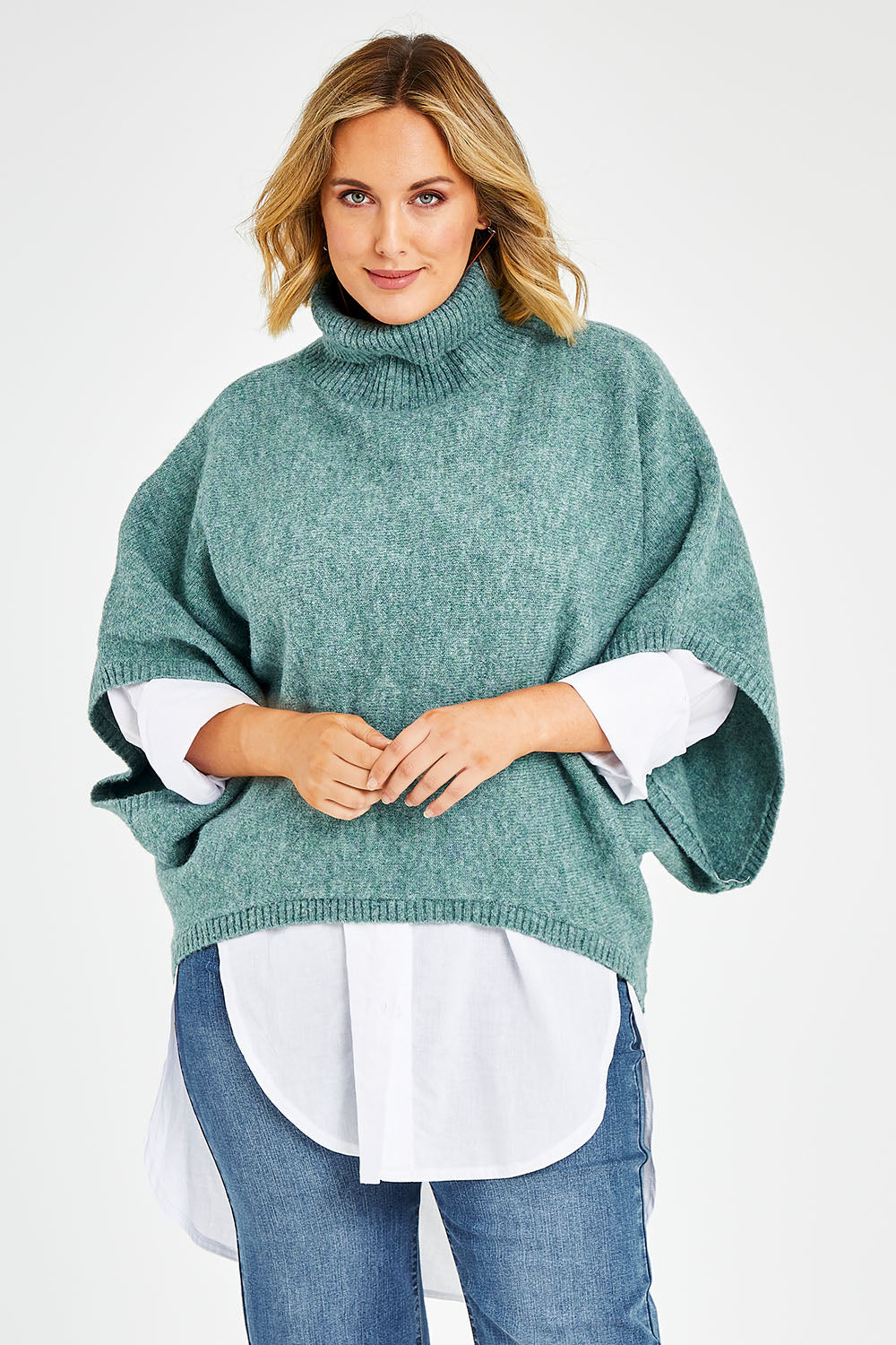 Model Jess wearing size L of the Addicted To You Sweater in colour Sea (Blue), from the front, cropped image