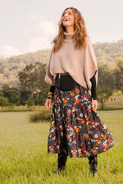 Model Ilona wearing size S of the Addicted To You Sweater in colour Camel, from the front, showing the whole outfit