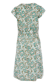 Product shot of the Daisy Dress in colour Aqua (Blue), from the back