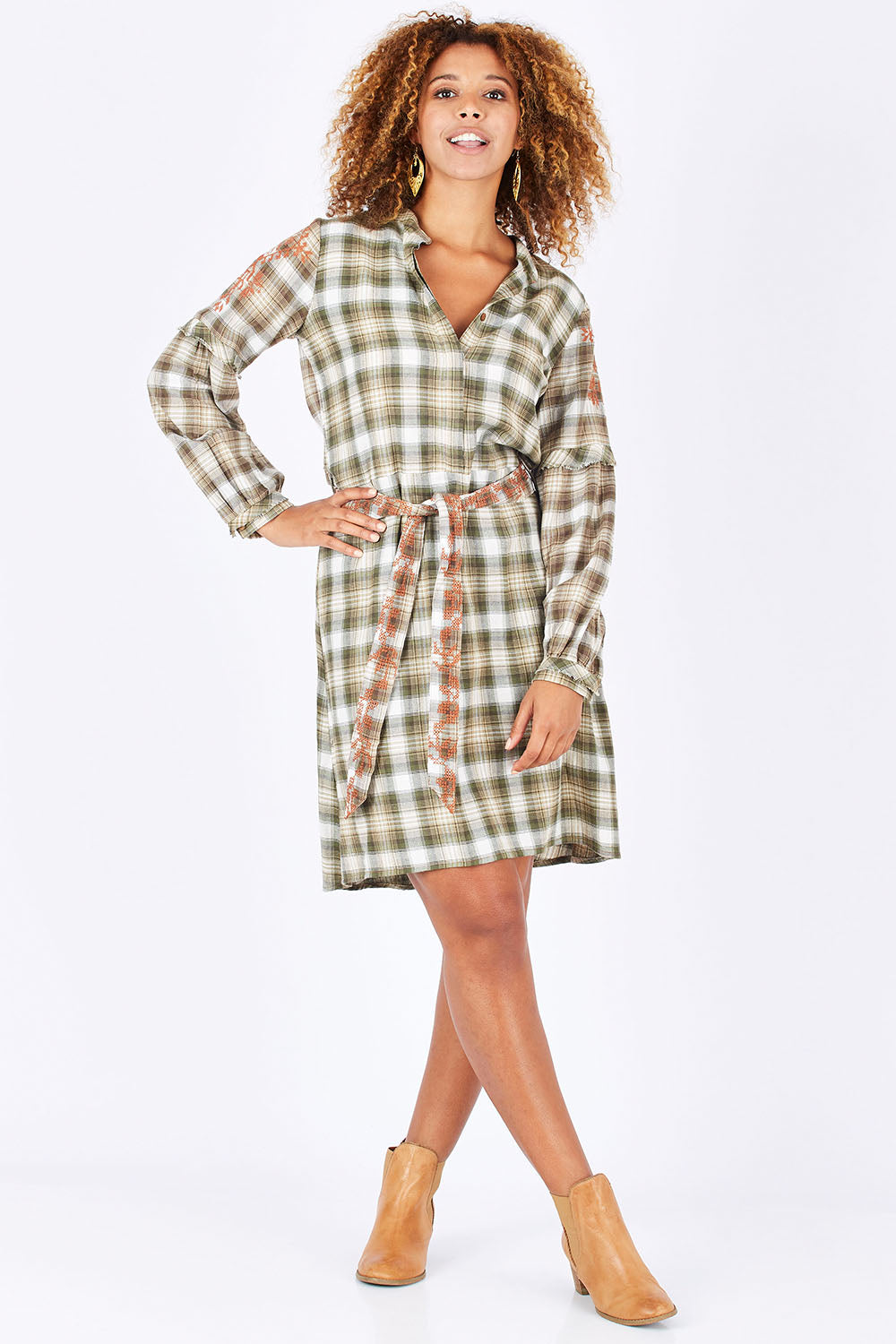 Model Summer wearing size 10 of the Myrtle Dress in colour Banksia (Green), from the front, showing the whole outfit
