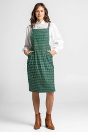 A model wearing the Berty Reversible Tunic in colour Fresconavy (Blue), from the front, showing the whole outfit