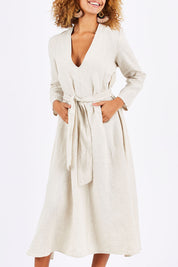 Model Summer wearing size S of the Wildflower Dress in colour NaturalLin, from the front, cropped image