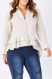 Model Laura wearing size M of the Peplum Top in colour Natural, from the front, cropped image